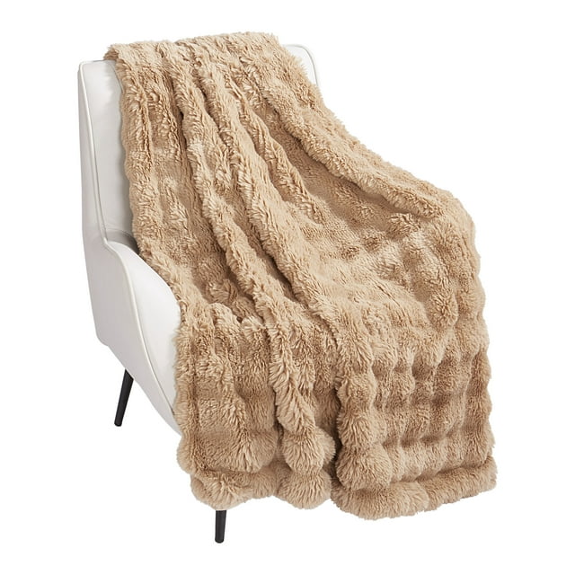 Holiday Time camel bubble faux fur throw blanket displayed on a white accent chair.