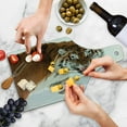 thumbnail image 4 of Tiger Cutting Board, Panthera Tigris Altaica Close-Image with Snowy Background Angry Hunter Photo, Decorative Tempered Glass Cutting and Serving Board, Wine Bottle Shape, Pale Brown, by Ambesonne, 4 of 5