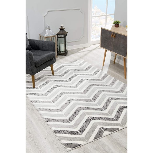 homeroots home decor 394034 4’ x 6’ Gray Distressed Chevron Area Rug