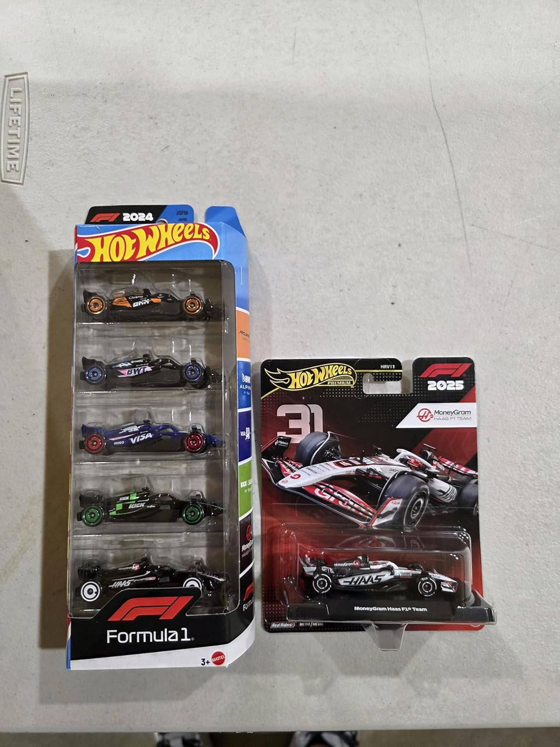 Hot Wheels Premium Formula 1 Die-Cast Cars, 2024 5-Pack and 2025 MoneyGram Haas F1 Team #31