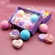 thumbnail image 5 of Set de regalo de bombas de baño para niños y adultos | Bombas de baño hidratantes de karité natural | Formas de corazón multicolor | Aromas de fresa, naranja, manzanilla y rosa del océano | Sp, 5 of 5