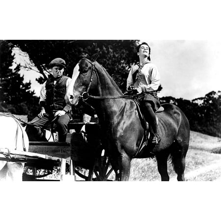 - Film still of Mickey Rooney and Elizabeth Taylor riding a horse in National Velvet Photo Print