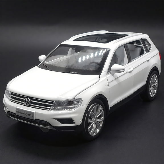 The 1:32 scale is suitable for Volkswagen Tiguan alloy die-cast car models, equipped with openable doors, lights, sound and spring-back function. Boys' toy cars, children's birthday gift toy cars.