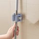 thumbnail image 4 of Soporte de pared para fregona con adhesivo resistente | Organizador de escobas sin taladro para baño y lavadero | Colgador resistente de acero inoxidable para rastrillo y pala | Paquete de 1, 4 of 7