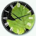 thumbnail image 1 of DesignArt Handpainted Green Leaf On Black Large Wall Clock, 1 of 2