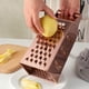 thumbnail image 1 of ADDHAT De Verduras Oro Rosa De Acero Inoxidable Con Superficie Lisa Y Mango, 1 of 8