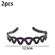 thumbnail image 2 of Juego de 2 diademas con peine para el pelo con dientes de tiburón de plástico negro, 2 of 5