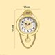 thumbnail image 2 of Reloj de pared de cuarzo silencioso for sala de estar, sencillo y elegante, con decoración de pared for dormitorio, reloj de pared oscilante retro europeo, 2 of 3