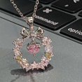 thumbnail image 2 of Collar con lazo de cristal, 2 of 5