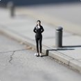 thumbnail image 2 of Figura de resina en miniatura Vendedora-manos hacia atrás, 2 of 8
