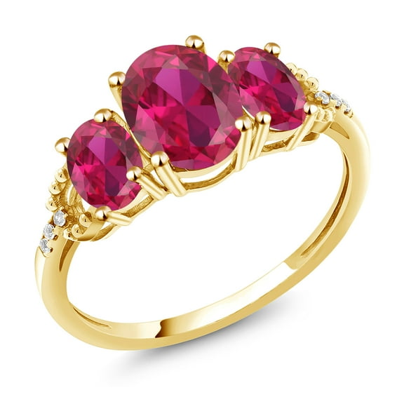 Gem Stone King 10K Yellow Gold Red Created Ruby and Diamond Accent 3-Stone Engagement Ring for Women | 2.54 Cttw | Oval 8X6MM and 6X44MM | Three Stone Wedding Anniversary Promise Ring| Size 6