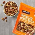thumbnail image 3 of Kirkland Signature Extra Fancy Unsalted Mixed Nuts, 2 Jars (2.5 LB), 3 of 4