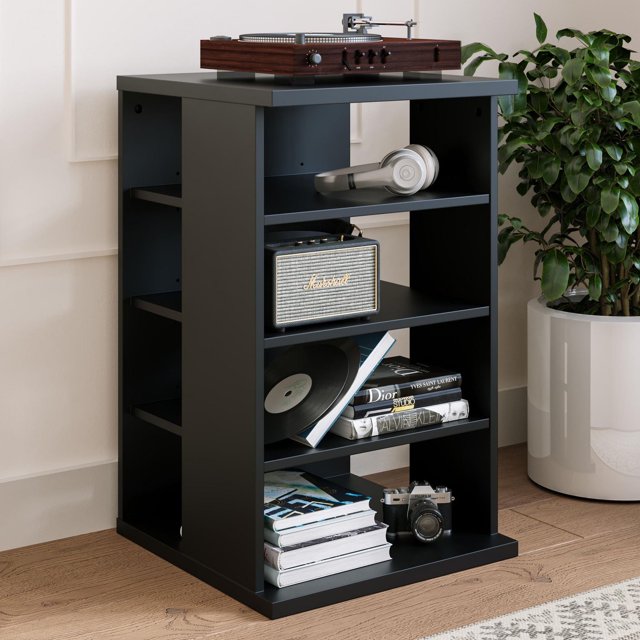 Nexera Jasper black 4-shelf audio tower bookcase holding a wooden turntable, silver headphones, Marshall speaker, vinyl records and fashion books.