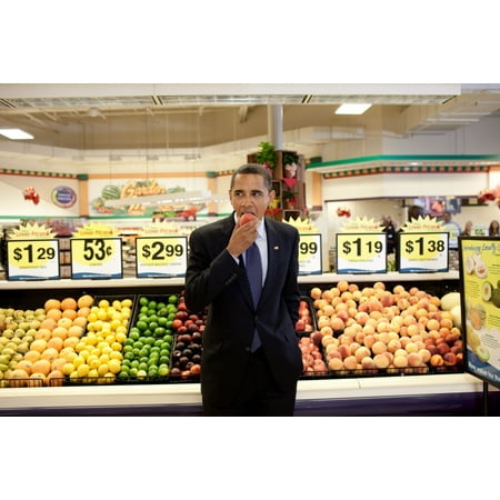 President Barack Obama Eats A Peach After A Town Hall Meeting At KrogerS Supermarket In Bristol Va On July 29 2009 Seconds Later The President Handed A Dollar Bill To The Ceo Of KrogerS Who Attended