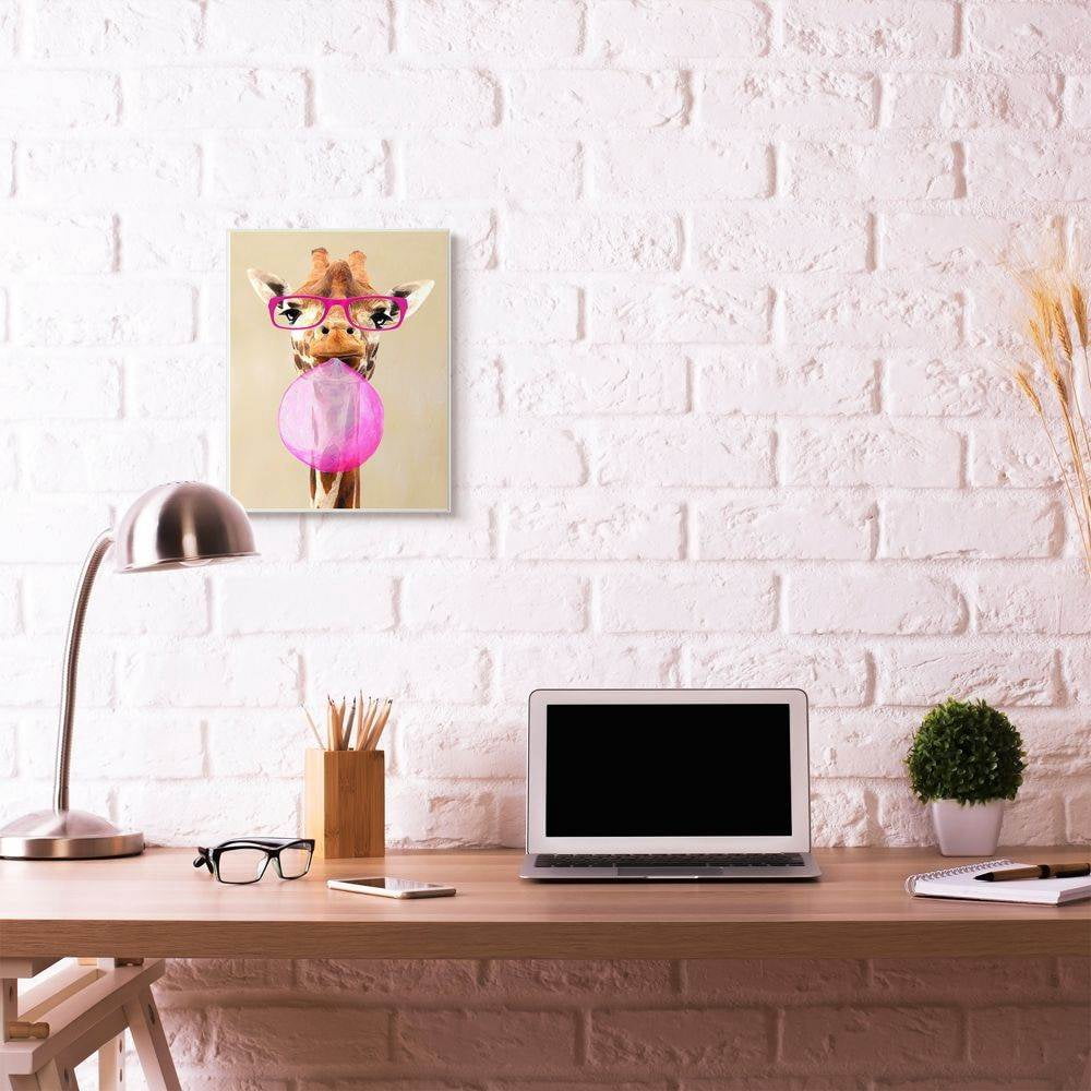 The Stupell Home Decor Collection Giraffe With Bubblegum and Pink Glasses Wall Plaque Art