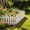 A, variant on Orangide Yard Fences High Low Style Small Mini Garden Fence Residential Decorative Border for Outdoor Landscaping Spring Summer Decor Edging