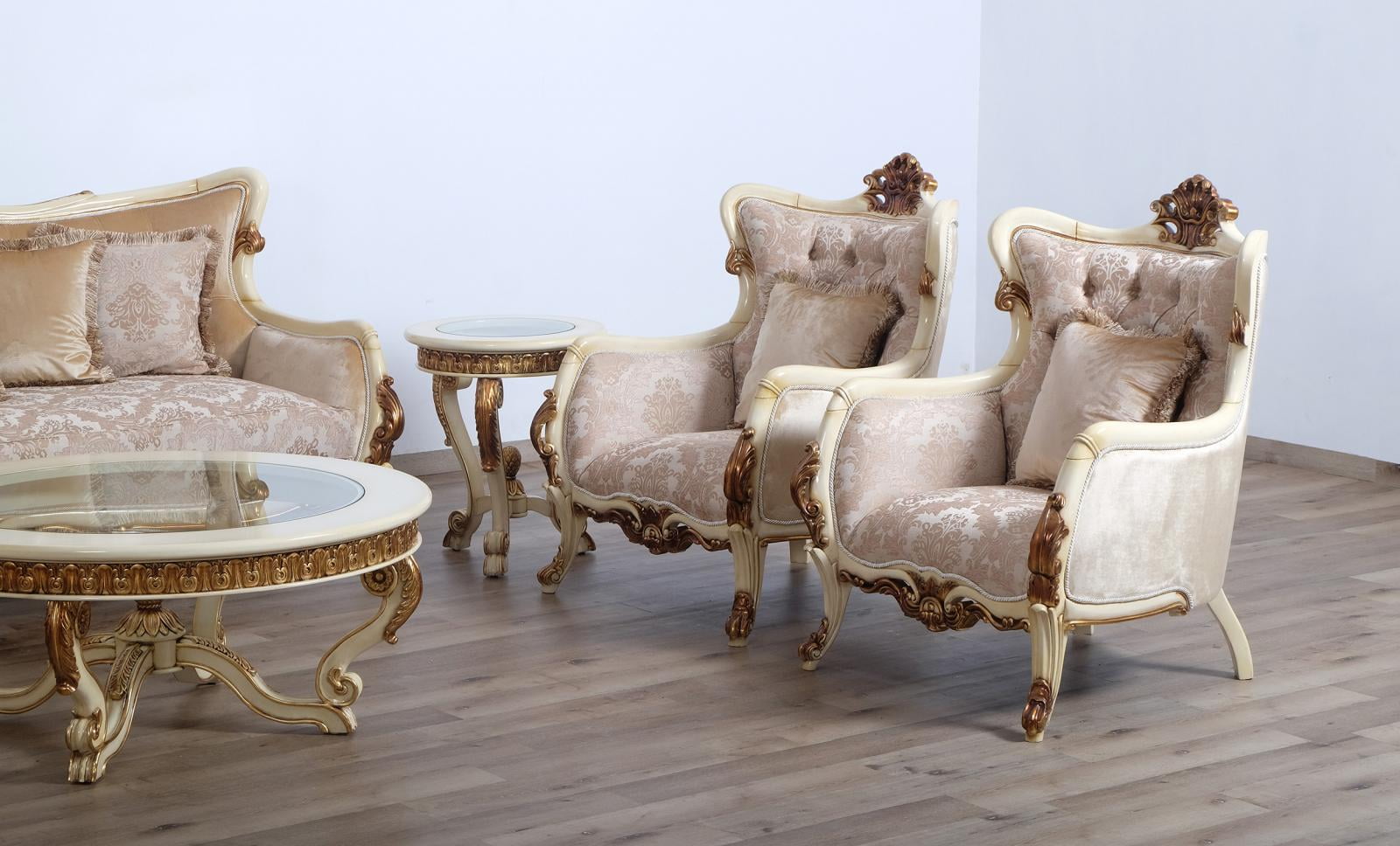 Angelica Round 47" Antique Beige Wood Coffee Table with Glass Top and Gold Leaf Accents