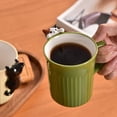 thumbnail image 3 of Taza de cerámica con diseño de animales trepadores, ideal for café, té, cacao, leche, hogar, oficina, etc., 3 of 9