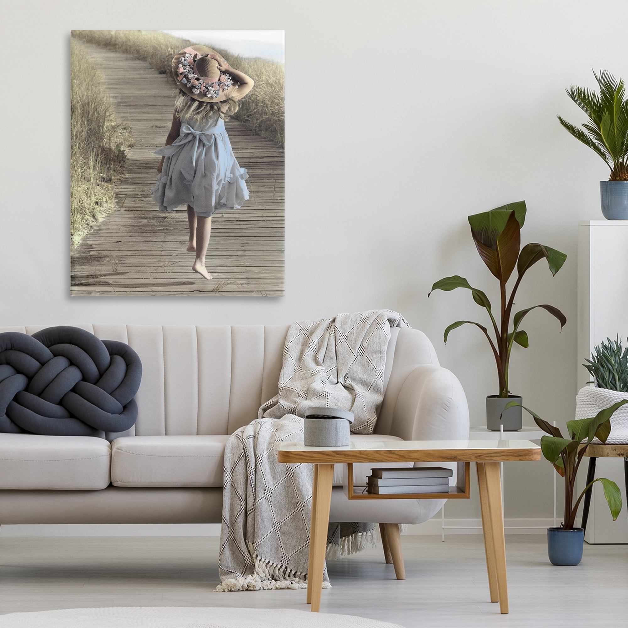 Stupell Industries Girl With Sun Hat Walking Canvas Wall Art, design by Kendra Dew