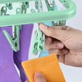thumbnail image 4 of Sock Drying Rack, Hanging Clothes Drying Rack with 32 Windproof Pegs, Collapsible Lingerie Sock Drying Rack for Socks, Underwear, Baby Clothes, Towels, 4 of 5