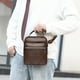 thumbnail image 5 of Bolso bandolera de piel sintética texturizada | Correa ajustable y ligera | Amplios compartimentos | Bolso de mano para uso diario, viajes y trabajo | Negro y marrón, 5 of 6