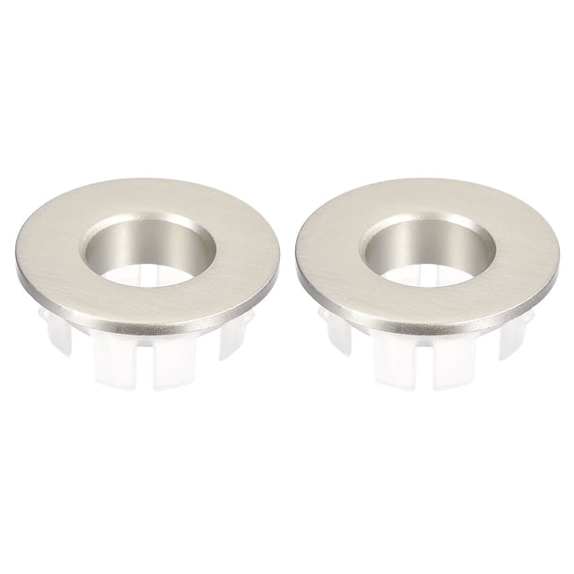 Unique Bargains 2Pack 22.5mm Sink Trim Overflow Cover Ring Hole Insert in Round Caps Brushed Silver. Two brushed silver sink overflow covers made of ABS plastic and copper, designed for 22-24mm overflow holes. Ideal for bathroom renovation, these covers feature a modern brushed finish and easy snap-in installation for sinks in homes, hotels, and kitchens.