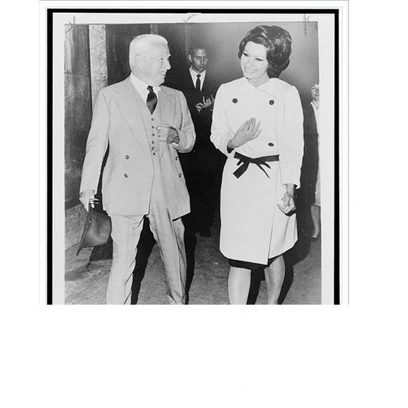 Historic Print, [Charlie Chaplin and Sophia Loren walking together on a movie set in London], 18" x 24"