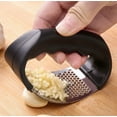 thumbnail image 1 of Trituradora de ajo manual de cocina, machacador de ajo pequeño for el hogar, machacador de ajo y jengibre, prensa de ajo con anillo de acero inoxidable, 1 of 4