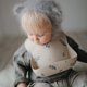thumbnail image 3 of Babero de silicona ajustable impermeable Mushie Flores Lilas, 3 of 9