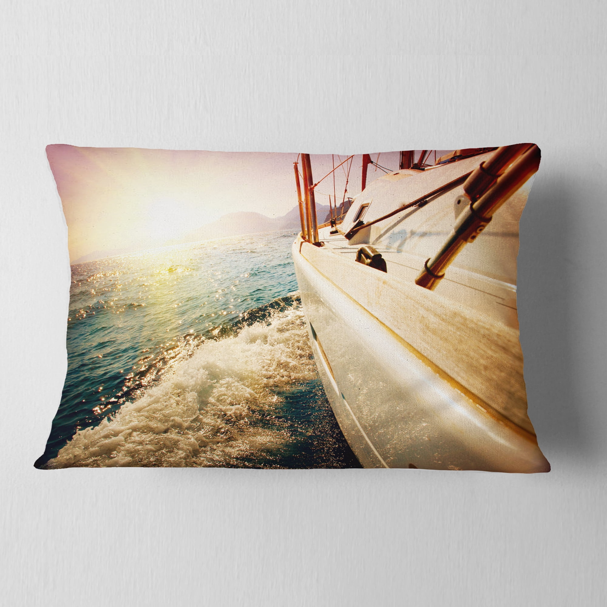 Designart Huge Yacht Sailing Against Sunset - Pier Throw Pillow - 12x20