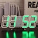 thumbnail image 1 of Reloj despertador digital LED de escritorio, silencioso, 3D, para sala de estar, dormitorio, marco blanco y personaje verde., 1 of 1