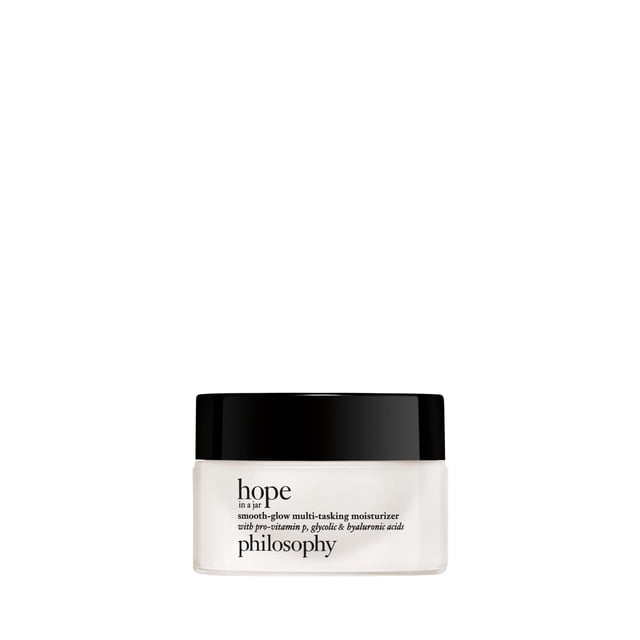 hidratante multi-tareas philosophy smooth-glow hope in a jar Crema para Arrugas Philosophy Hope in a Jar, vista frontal centrada; tarro blanco opaco con tapa negra brillante y texto negro en la etiqueta que muestra la marca, dimensiones 2.0 x 2.0 x 1.7 cm según especificación, indicado en la descripción para hidratación, mejora de textura y tratamiento de arrugas, formato compacto adecuado para la rutina diaria.