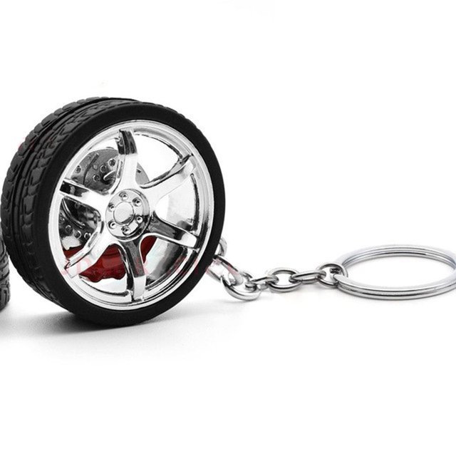CLEOES Gracioso Llavero de llanta Creativo Discos de freno llavero Llavero de rueda de coche Aleación Colgante de bolso Llavero de coche Accesorios de coche Regalo Neumático simulado/Multicolor