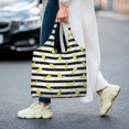 thumbnail image 5 of Xecao's Lemon_1 Canvas Tote Bag is a versatile choice for women, serving as a stylish beach bag, shopping bag,and reusable grocery bag., 5 of 5