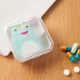 thumbnail image 1 of Mini caja de almacenamiento de pastillas de plástico vacía portátil con 4 ranuras, transparente, con dibujos animados, accesorios de viaje, 1 of 3
