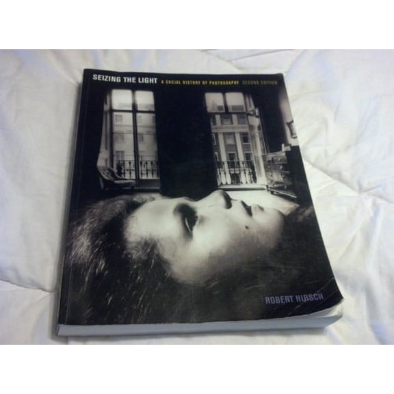 Pre-Owned Seizing the Light: A Social History of Photography