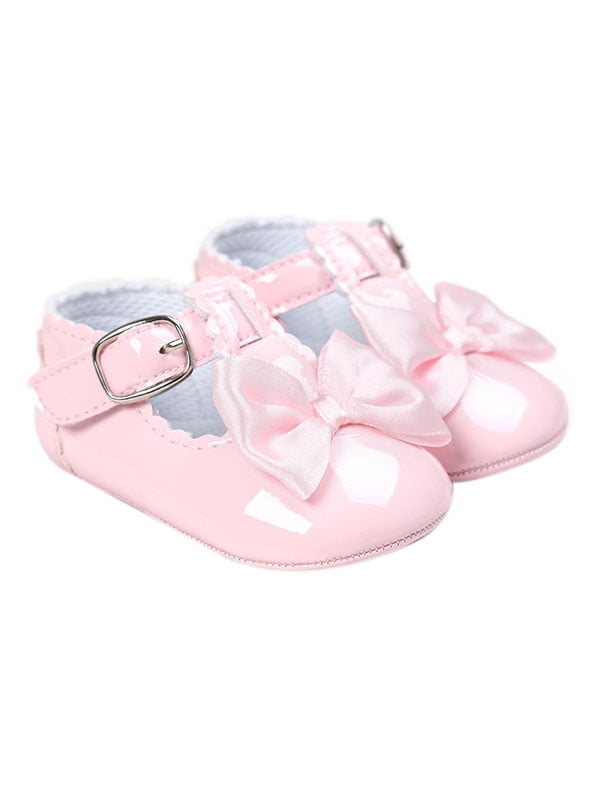 pink and blue baby shoes
