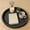 black_Base#598, variant on Black Round Wooden Decorative Tray with Ribbed Design, 12 Inch Black Serving and Display Tray for Candles, Vases, Coffee Table or Countertop Decor