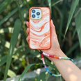 thumbnail image 4 of Caseco Étui Tourbillon Orange MagSafe pour iPhone 14 Pro, 4 of 5