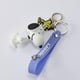 thumbnail image 4 of Llavero colgante MINISO Walking Snoopy Summer Travel, 4 of 8