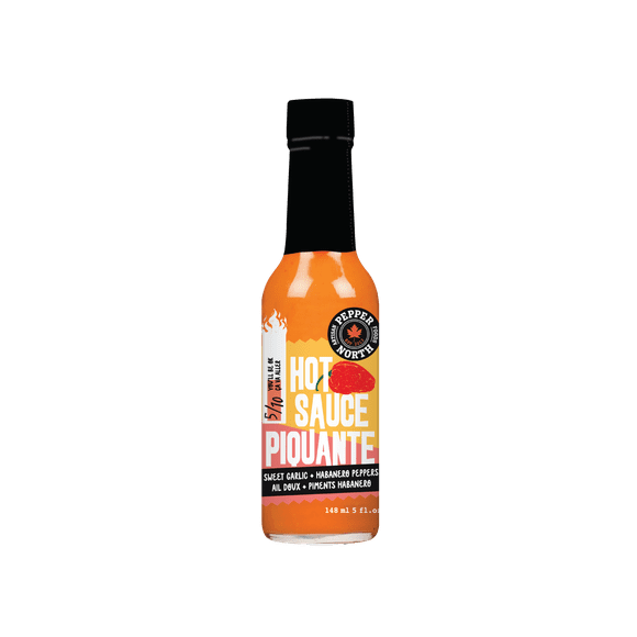 Pepper North Sweet Garlic + Habanero Peppers Hot Sauce, Try it on pizza, tacos, chicken wings, eggs, french fries, vegan bowls and more.