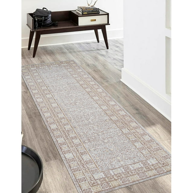 ECARPET Valeria traditional runner rug featuring detailed beige and brown geometric patterns, displayed on light wood flooring under a dark wooden console table with books and bag.