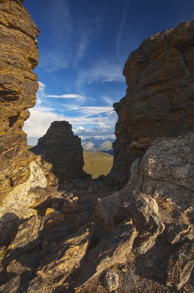 Light and shadows at Rock Cut formation near the Trail Ridge Road with Longs Peak in the background at Rocky Mountain National Park Colorado United States of America Canvas Art - Carl Johnson Design