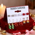 thumbnail image 1 of Pendientes festivos con cascabeles de colores, Papá Noel y árbol de Navidad, pendientes de hierro., 1 of 6