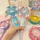 thumbnail image 5 of Nuevo Mini ventilador portátil de Hello Kitty Cinnamoroll con dibujos animados, paquete de Material hecho a mano Diy, miniventilador portátil con carga Usb, regalo portátil, 5 of 5