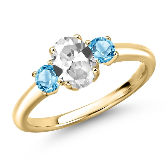 Gem Stone King 10K Yellow Gold White Created Sapphire and Swiss Blue Topaz Engagement Ring for Women | 1.40 Cttw | Oval 7X5MM | Gemstone September Birthstone | Size 5