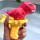 thumbnail image 2 of Pistola de agua para niños 4PCS Juguetes de piscina Juguetes de agua de verano Pistolas de chorro de dinosaurios Juguetes para niños al aire libre Piscina Juegos de playa Patio trasero Jugue, 2 of 4