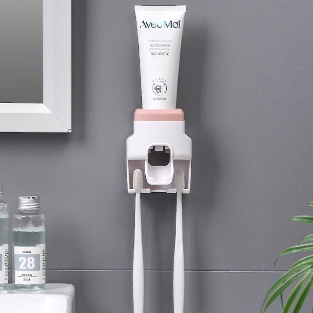 Juego de soporte para cepillos de dientes con ventosa para montaje en pared para niños, color rosa, dispensador automático de pasta de dientes con exprimidor sin perforaciones