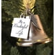 thumbnail image 1 of Adorno navideño con forma de campana y alas de ángel de acero inoxidable inspirado en "Qué bello es vivir", 1 of 5