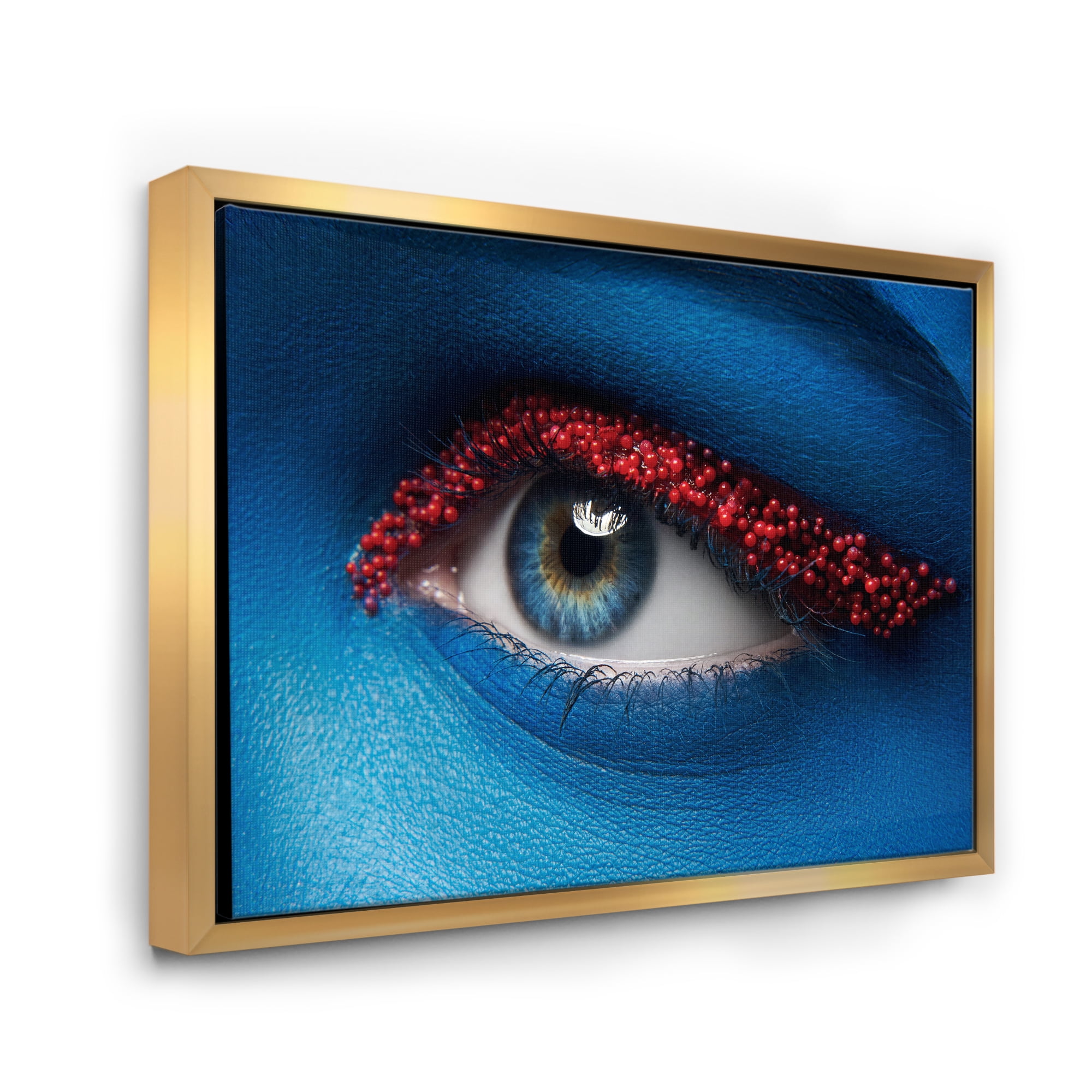 Designart 'Woman Eye With Blue Paint On Face & Red Balls' Modern Framed Canvas Wall Art Print
